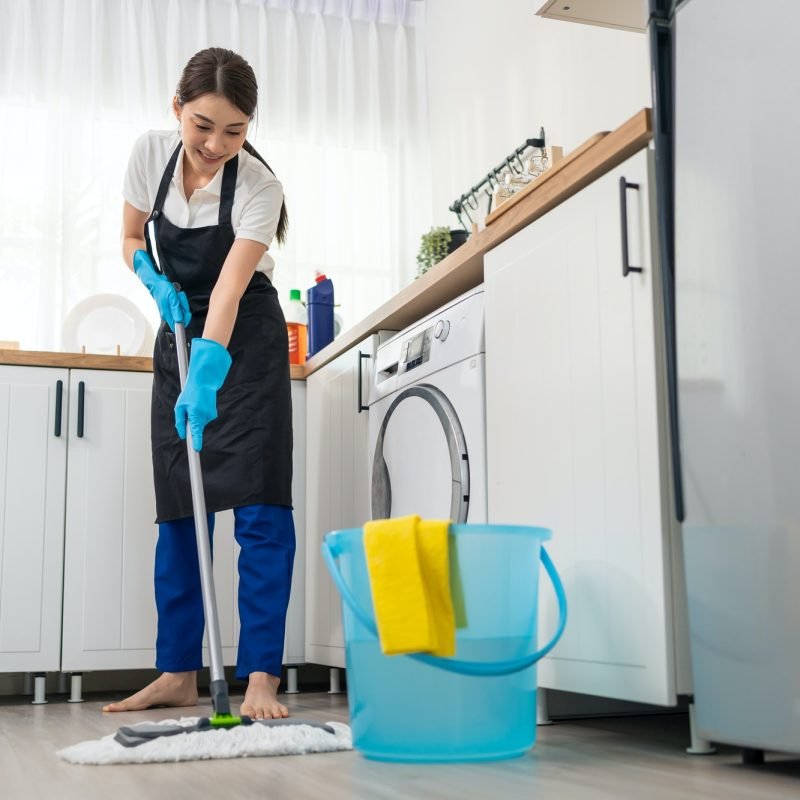 asian-active-cleaning-service-woman-worker-cleaning-feel-happy-in-kitchen-at-home-.jpg